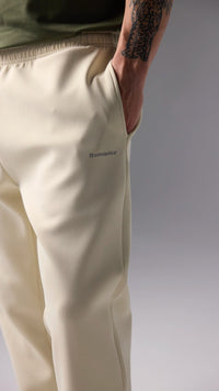 PANTALÓN TECH DUSTY CREAM