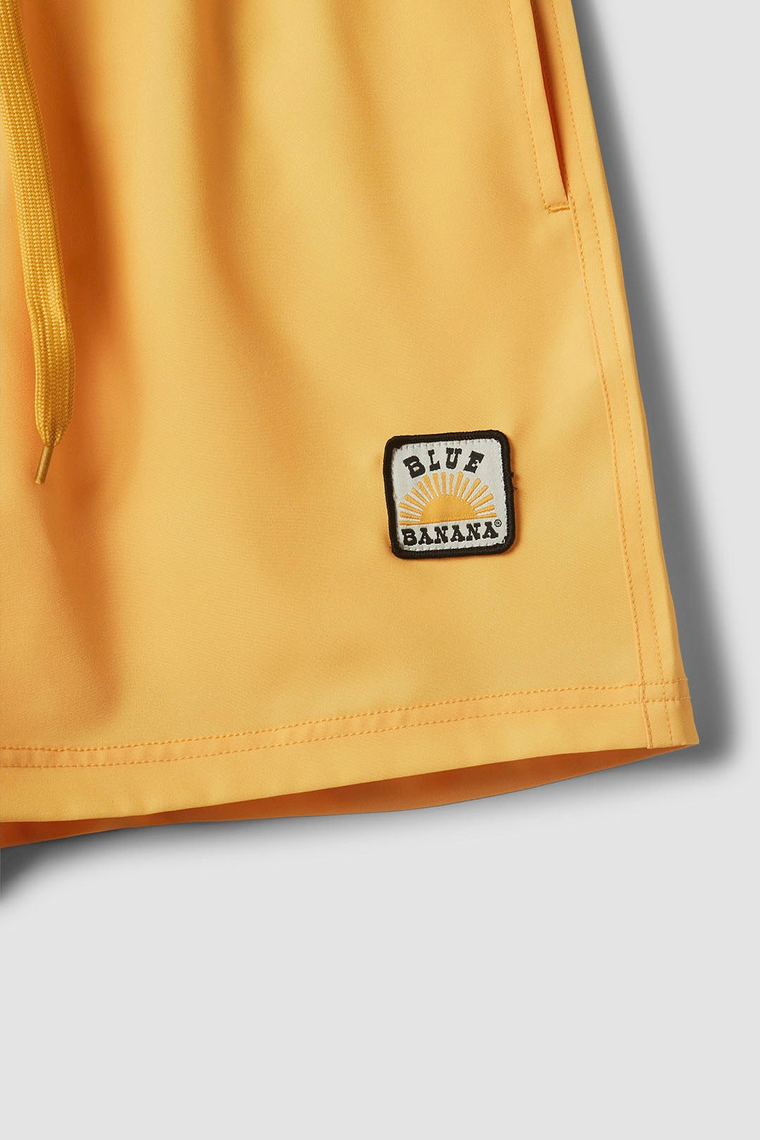 YELLOW DIVE SWIMMING TRUNKS